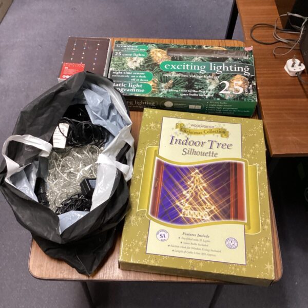 Selection of vintage Christmas lights in original packaging.