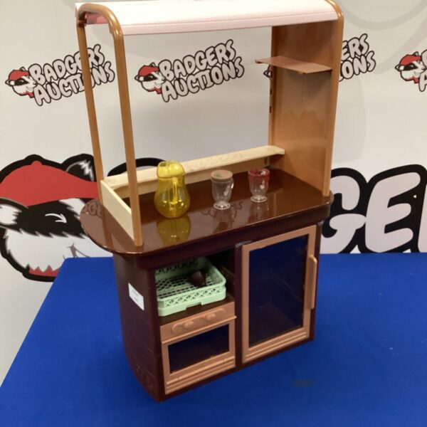 Vintage Cindy Scale ice cream stall with accessories displayed.