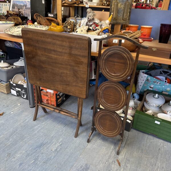 Antique mahogany folding table with cake stand, Victorian era.