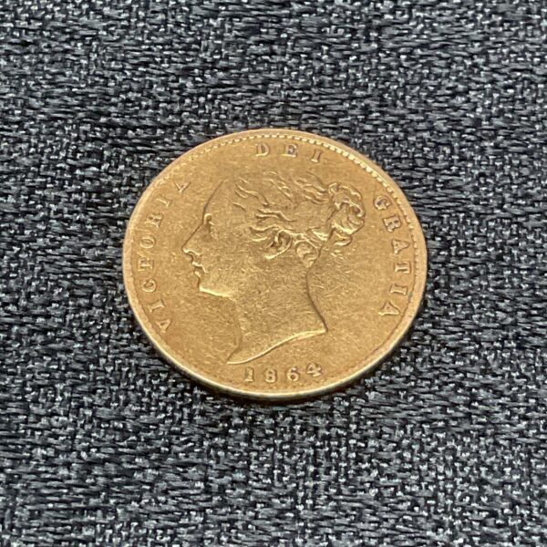 1864 gold half sovereign coin obverse with Young Victoria portrait.