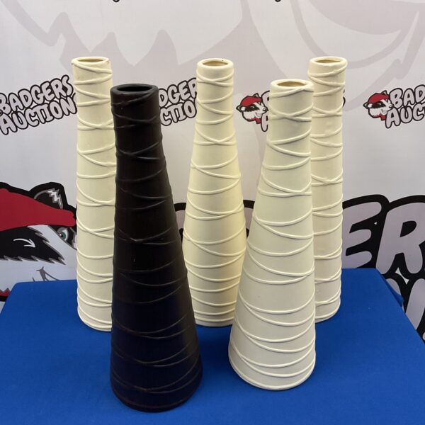 Lot of five modern ceramic banded vases for home decor.