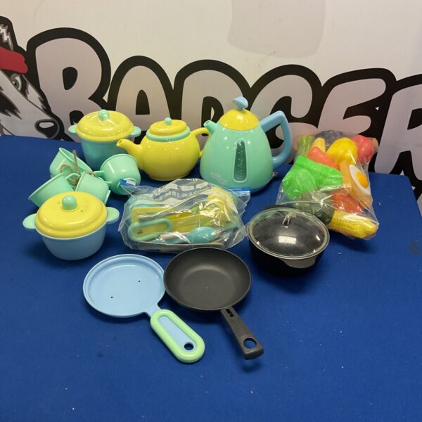 Colourful childrens toy kitchenware set with play food.