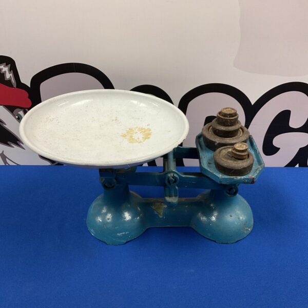 Vintage cast iron scales with enamel pan and weights.