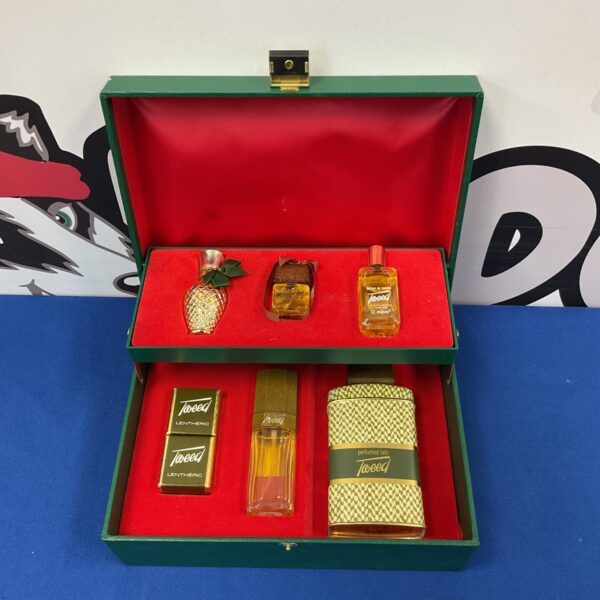 Vintage Tweed perfume set with floral design, collectible item.