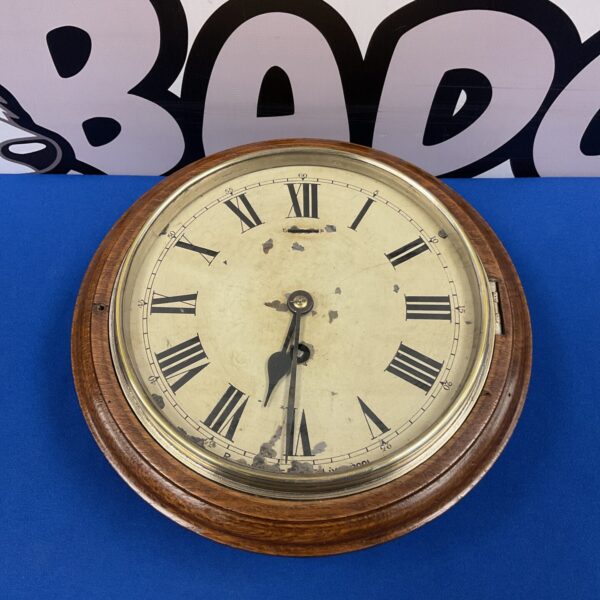 Vintage Smiths Astral wall clock with black numerals.