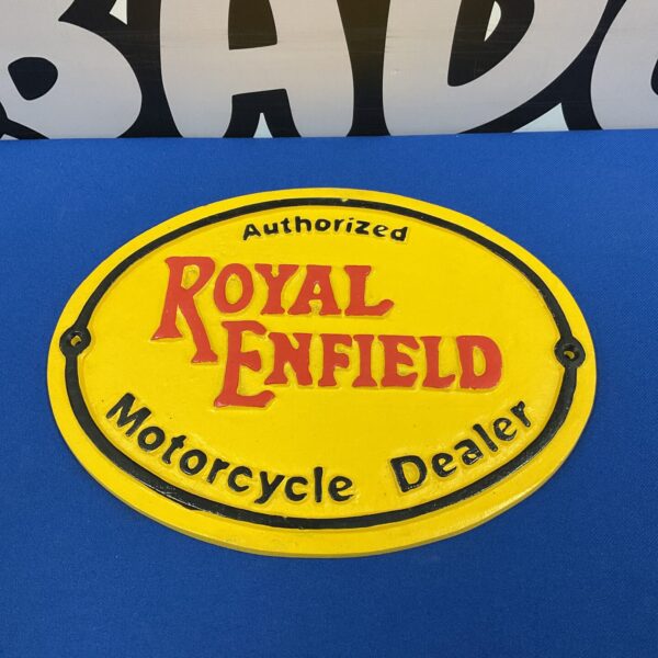 Vintage Royal Enfield dealer plaque, cast iron motorcycle signage.