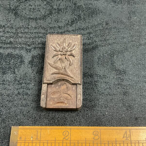 Antique Black Forest thermometer with edelweiss carving, detailed wood work.