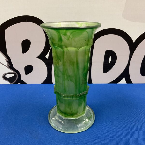 Antique green cloud glass vase with swirling pattern.
