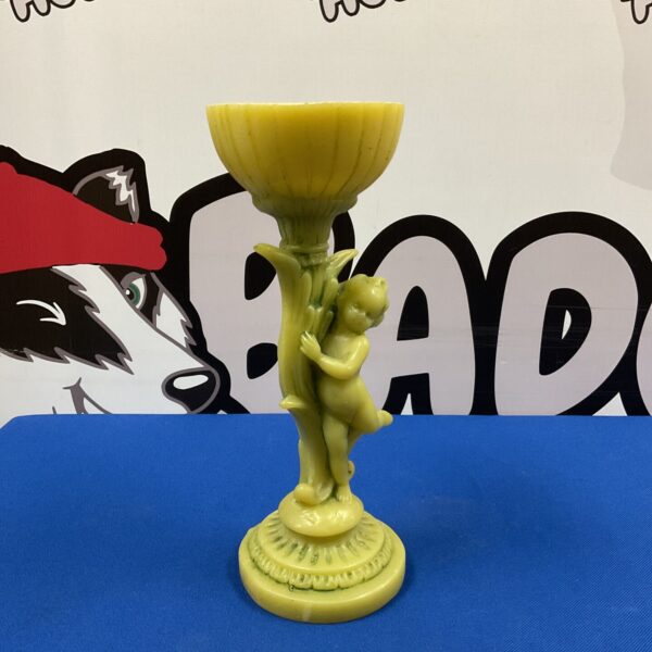 Vintage green cherub pedestal dish, a collectible decorative piece.