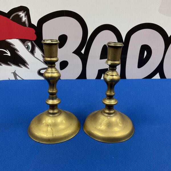 Pair of vintage brass candlesticks with a warm patina.