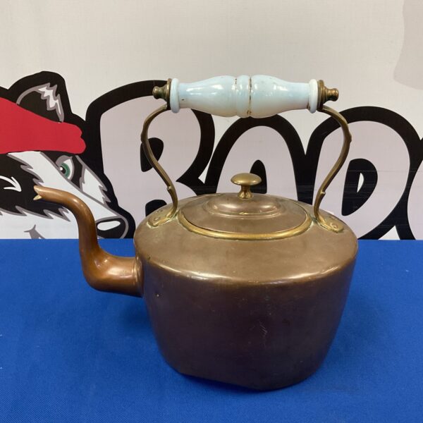 Vintage copper kettle with glass handle, antique kitchenalia collectible.