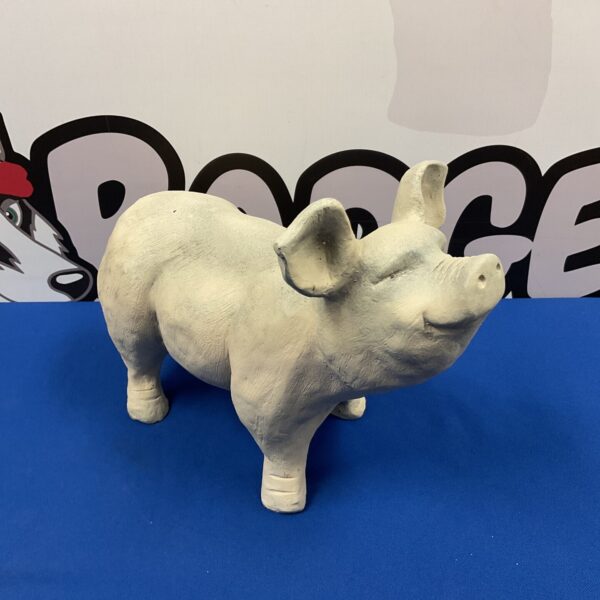 Vintage cast iron butcher shop pig advertising display.
