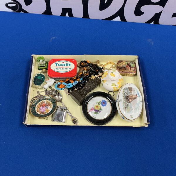 Vintage tray lot with curios and a lighter.