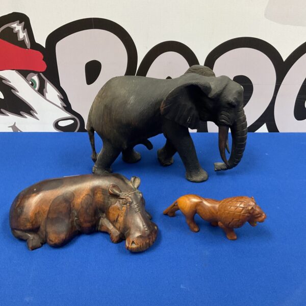 Set of three hand-carved African wooden animals.