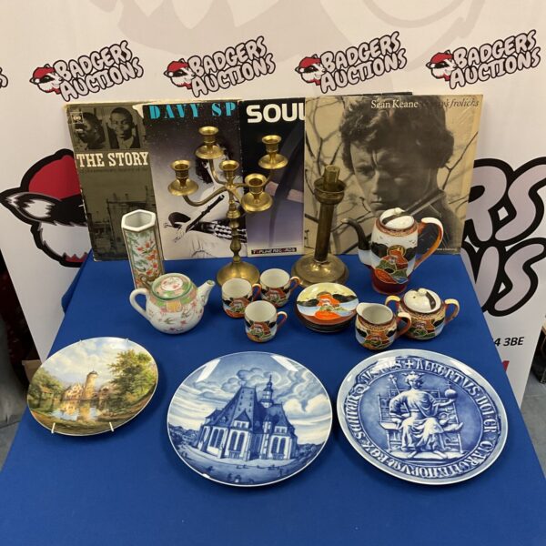 Vintage collectible lot with coffee set, candlesticks, and vinyl records.