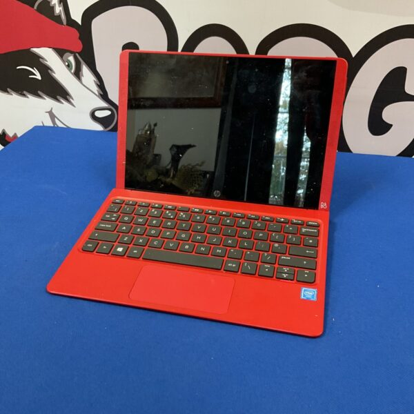 Red HP i7 laptop computer for parts or collection.