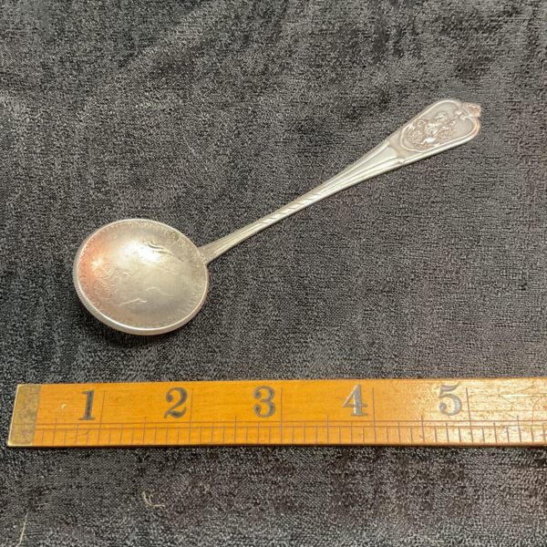 Antique Russian Rouble silver spoon with detailed bowl and handle.