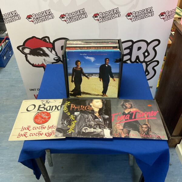 Collection of 12 inch vinyl singles spanning various music genres.