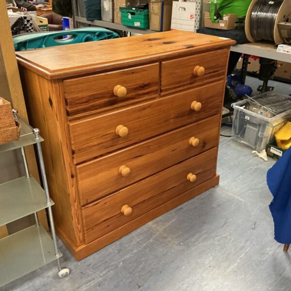 Vintage pine dressing table with five drawers.
