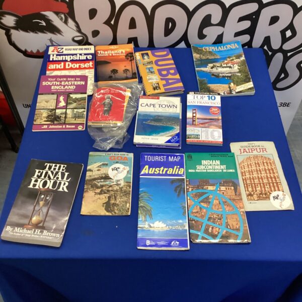 Vintage travel book collection featuring Dubai, Thailand and Indian subcontinent guides.
