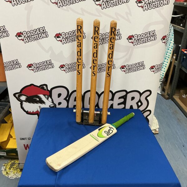 Junior cricket set with Kookaburra bat and stumps for young players.