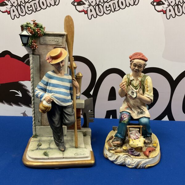 Detailed Capodimonte cobbler figurine with tools and workbench.