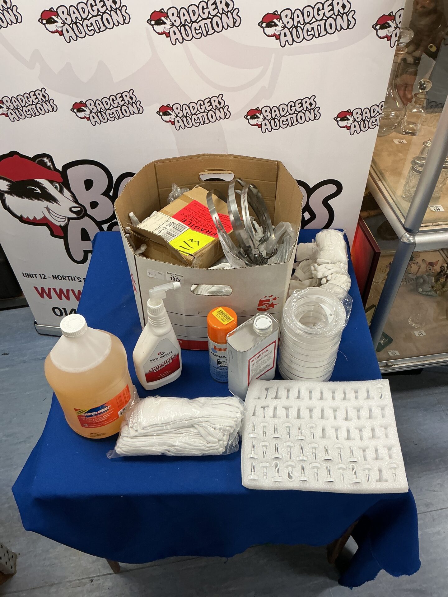 1072 Box of cleaning products and hardware