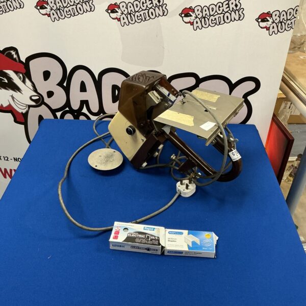 Industrial bench stapler for securing booklets and documents.