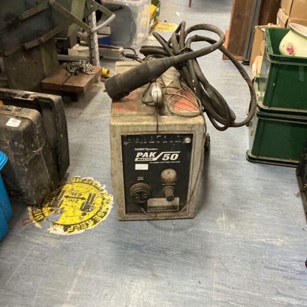 Vintage Pak Master 50 welding machine with torch attachment.