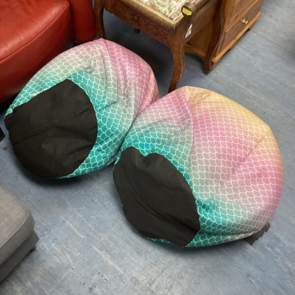 Two RUcomfy beanbag chairs with a scale pattern for comfortable seating.