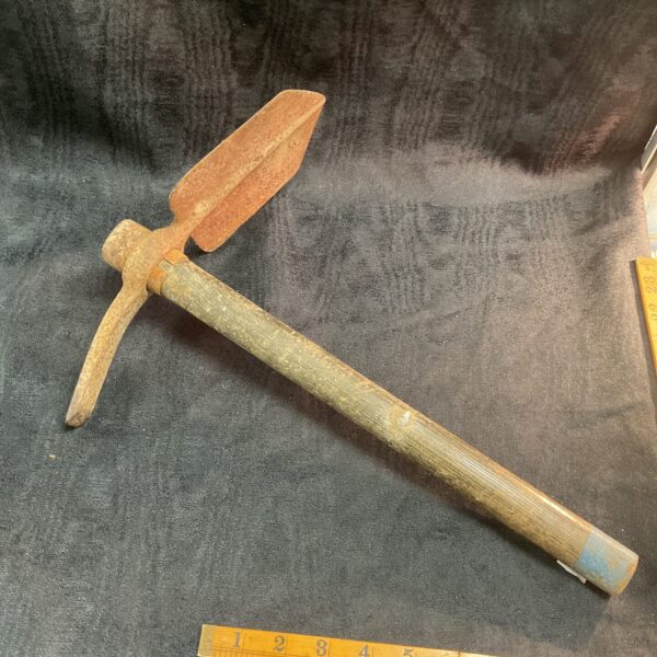 Vintage WW2 British Army trenching tool, side view.