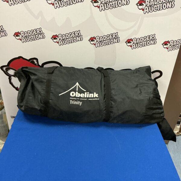 Used Obelink Trinity two-person tent for camping and outdoor adventures.