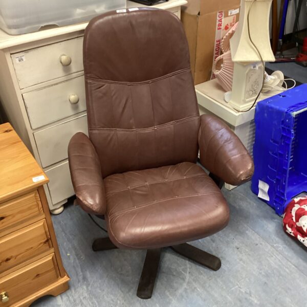 Vintage brown leather recliner chair with swivel base.