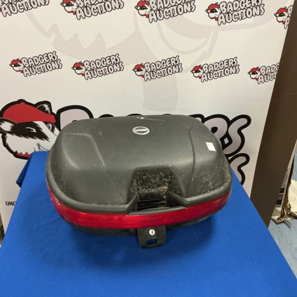 Black Givi motorbike back box for secure storage.