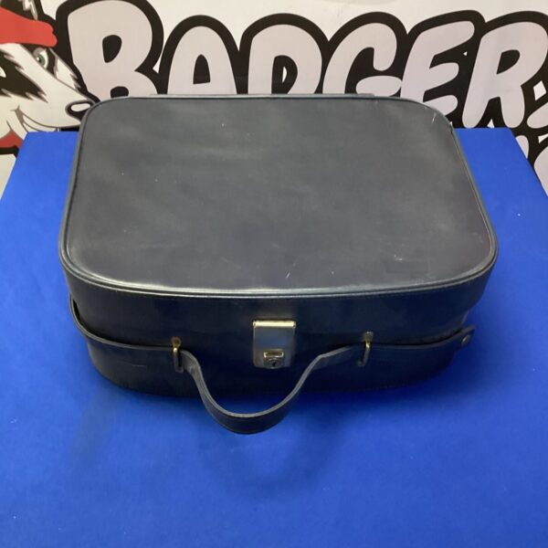 Front view of a vintage hand luggage bag.
