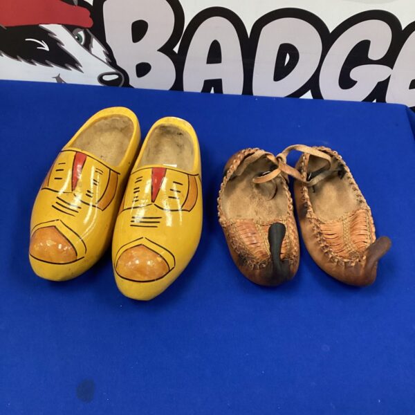 Vintage Serbian leather shoes with wooden soles, traditional footwear.