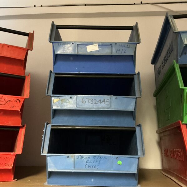 Three vintage metal workshop storage trays marked M12.