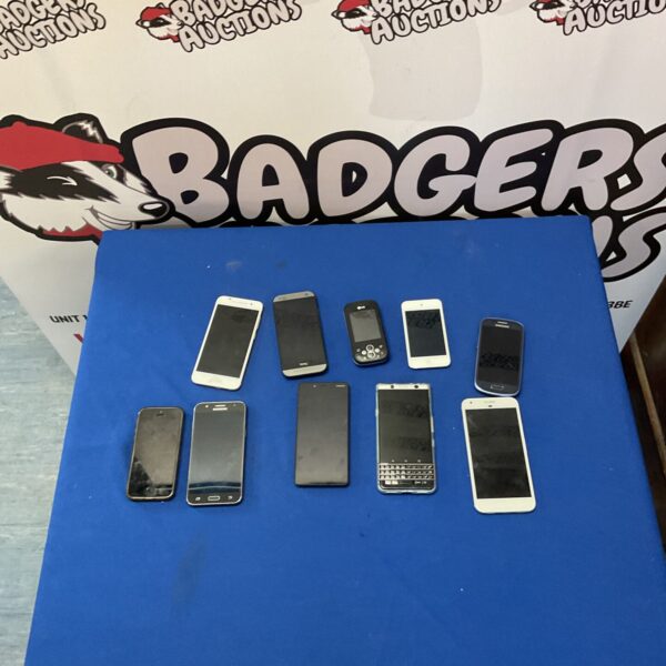 Assortment of used smartphones from various brands in a lot.