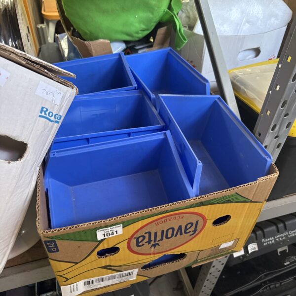 Blue RS storage trays for industrial racking systems.