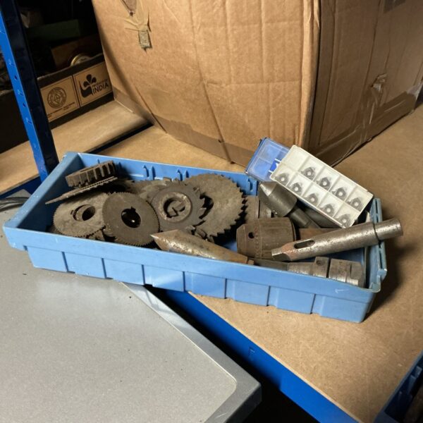 Lot of vintage engineering cogs and chucks for restoration.