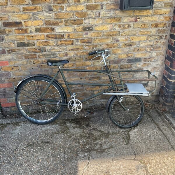 Vintage 1960s kettle bike with a hand-built basket.