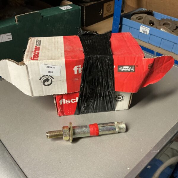 Two boxes of Fischer 2180 anchor bolts for construction projects.