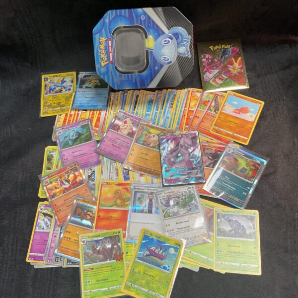 Pokémon card lot with a variety of cards visible.