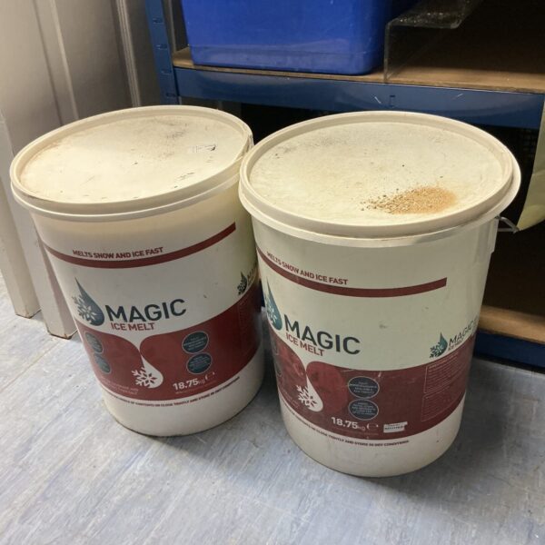 Two tubs of Magic ice melt, one full and one half full.