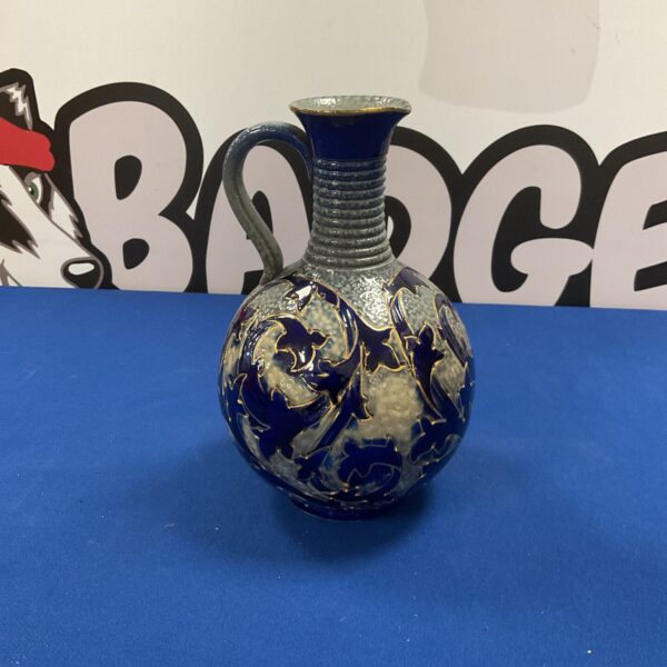 Antique Sarreguemines ewer with blue and white decoration.