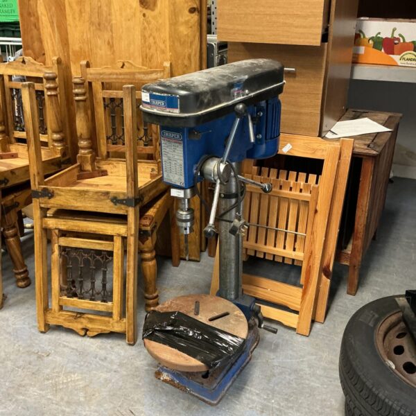 Draper pillar drill in a workshop setting.