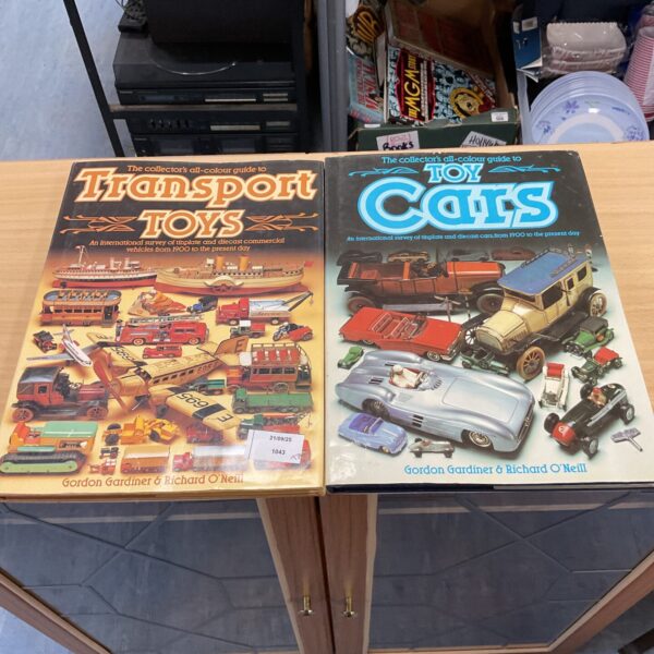Lot of vintage toy car reference books for collectors.