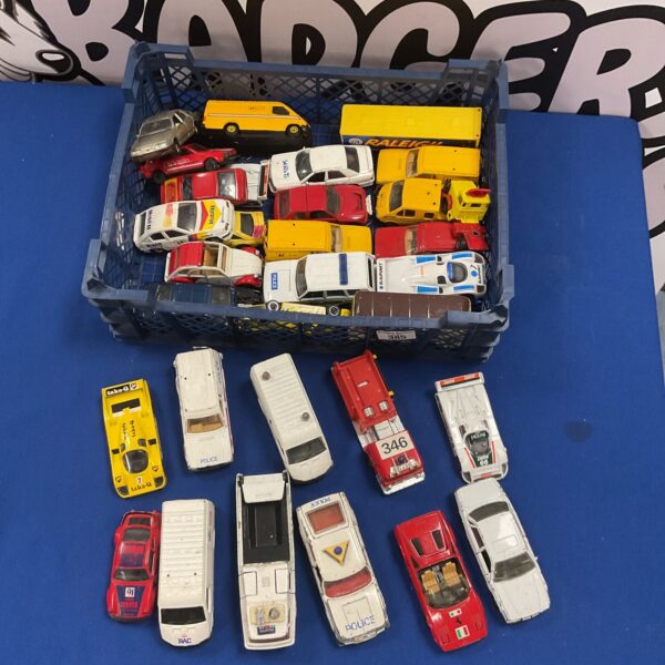 Vintage Corgi diecast vehicle lot with various models and colours.
