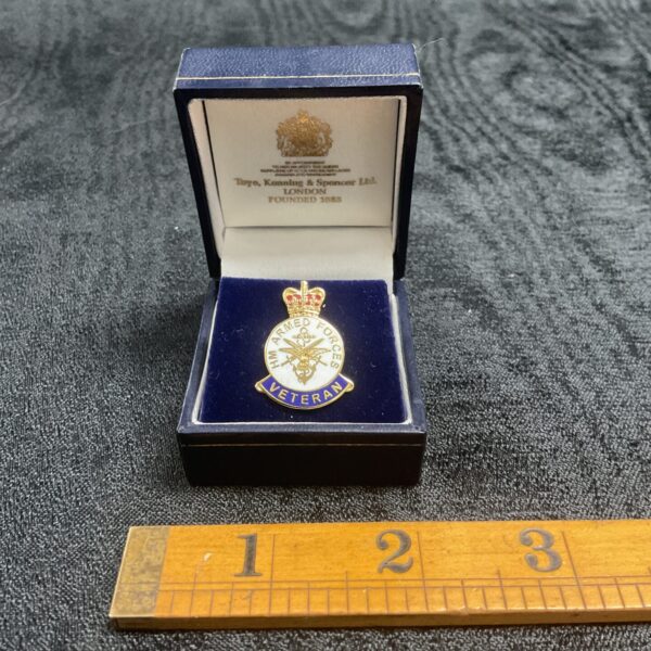 Toye Kenning & Spencer Armed Forces Veteran pin badge.