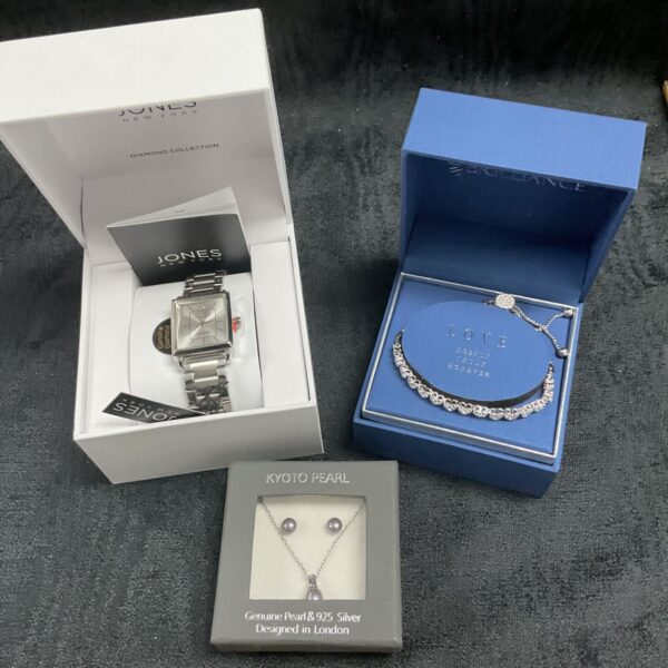 Boxed Jones of New York watch and jewellery set, including pearl necklace.